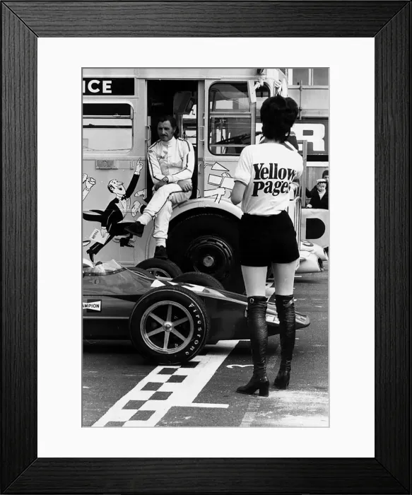 Framed Print : Graham Hill with Yellow Pages girl 1971 Framed Print : Graham Hill with Yellow Pages girl 1971