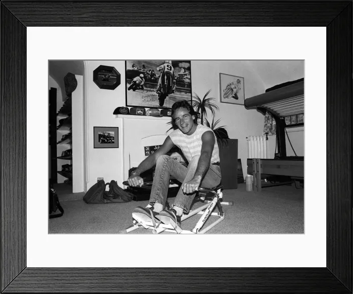 Framed Print : Motorcyclist Barry Sheene at home working out 1984 on rowing machine Framed Print : Motorcyclist Barry Sheene at home working out 1984 on rowing machine
