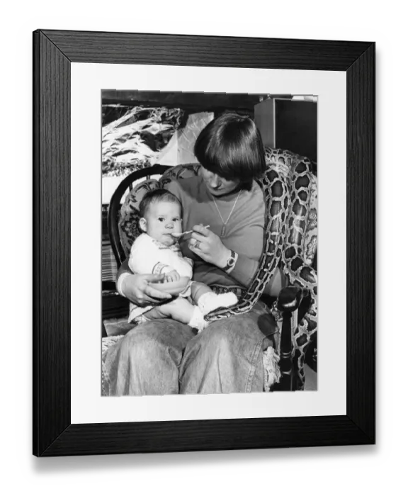 Framed Print : Animals Snakes and Children. Melanie demonstrates just how cuddly a pet a python can be Framed Print : Animals Snakes and Children. Melanie demonstrates just how cuddly a pet a python can be