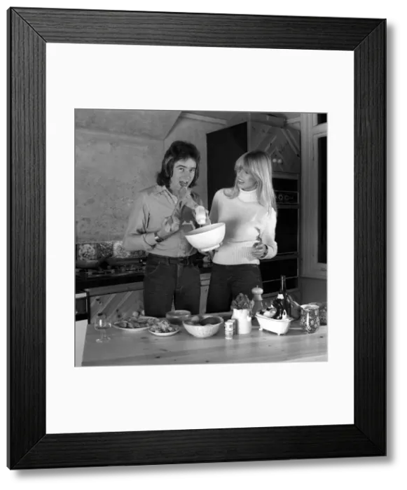 Framed Print : Barry Sheene with girlfriend Stephanie McClean at home in kitchen making food