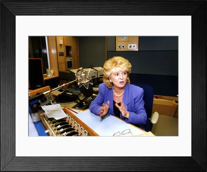 Framed Print : Gloria Hunniford TV and Radio Presenter sitting at a desk in a Radio Studio Framed Print : Gloria Hunniford TV and Radio Presenter sitting at a desk in a Radio Studio