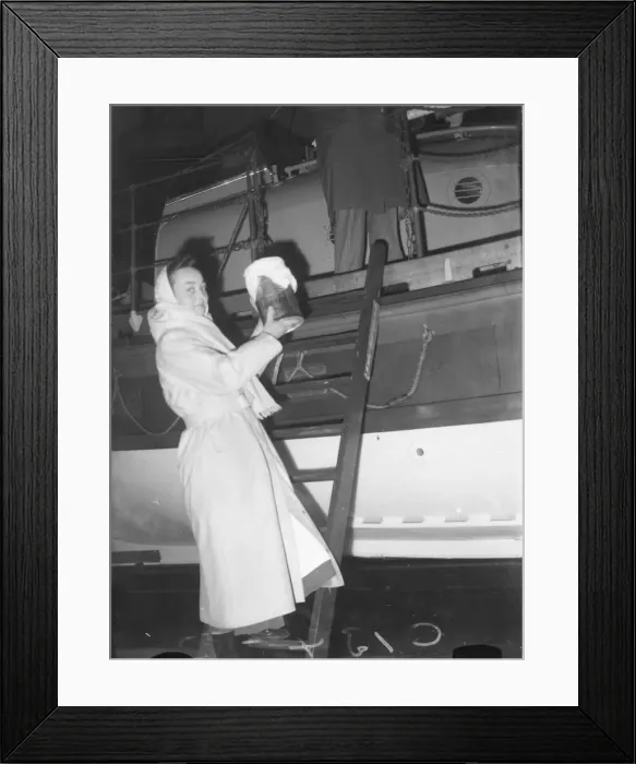 Framed Print : Sister Clevely stepping aboard the SENNEN lifeboat january 1952 C134 / 2 Framed Print : Sister Clevely stepping aboard the SENNEN lifeboat january 1952 C134 / 2