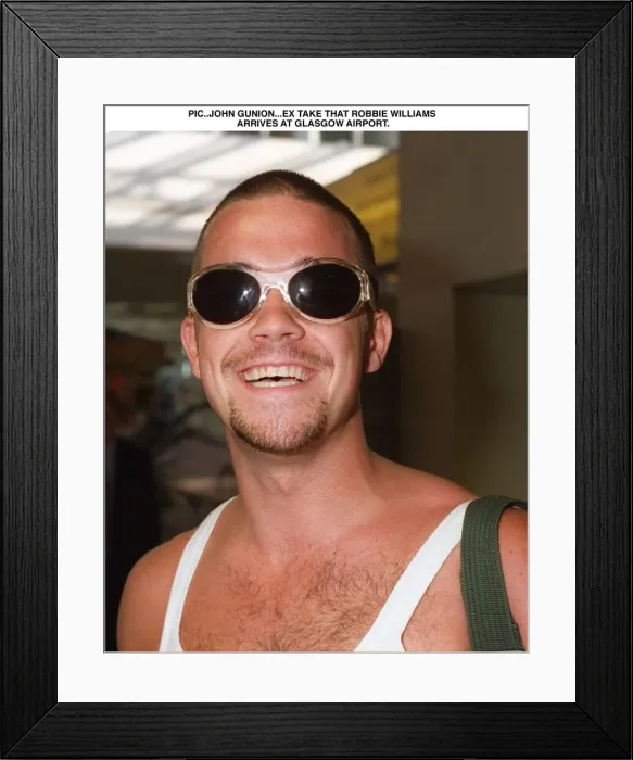 Framed Print : Robbie Williams arrives Glasgow Airport T In The Park festival August 1995