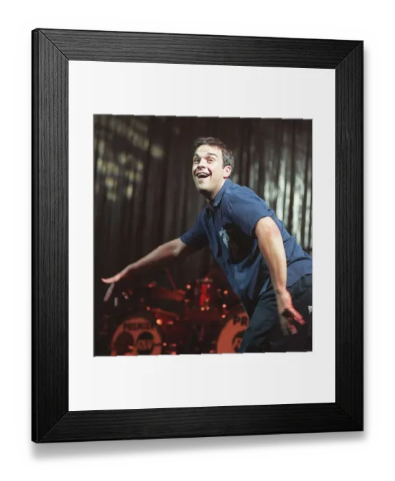 Framed Print : Robbie Williams dances at his concert at the SECC Glasgow February 1999 Framed Print : Robbie Williams dances at his concert at the SECC Glasgow February 1999