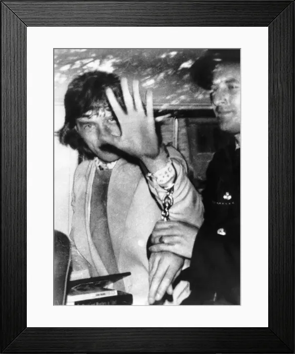Framed Print : Rolling Stones: Mick Jagger on his way from court in Chichester to Lewes Jail 28th June