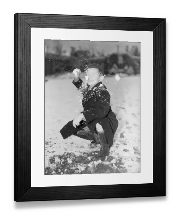 Framed Print : Snowball Fight Petts Wood, Kent Child, Boy is hit in the face with a snowball Framed Print : Snowball Fight Petts Wood, Kent Child, Boy is hit in the face with a snowball