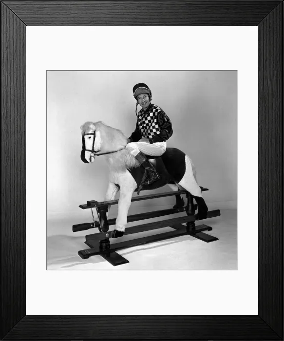 Framed Print : Lester Piggott stands next to Rocking Horse in the Daily Mirror studio after being told Framed Print : Lester Piggott stands next to Rocking Horse in the Daily Mirror studio after being told