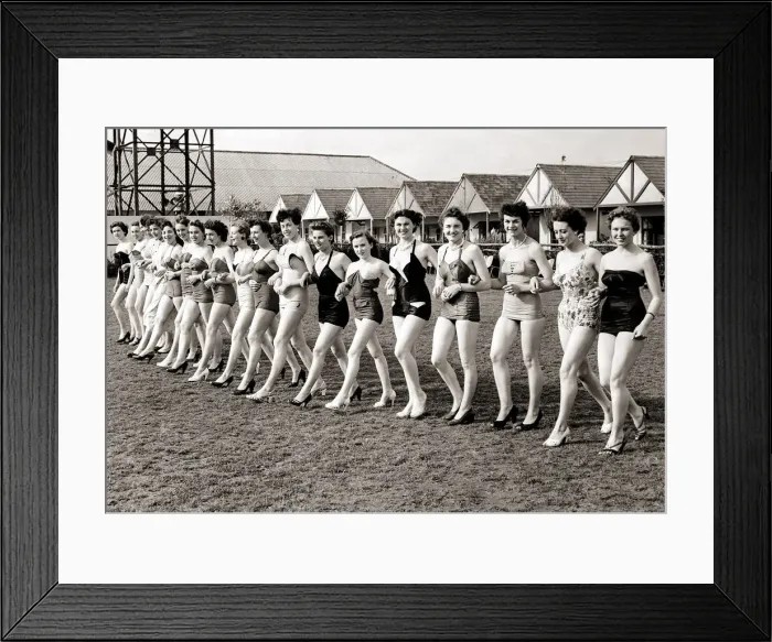 Framed Print : Happy smiles from a line of beauties as a competitors for the Holiday Princess walk to Framed Print : Happy smiles from a line of beauties as a competitors for the Holiday Princess walk to