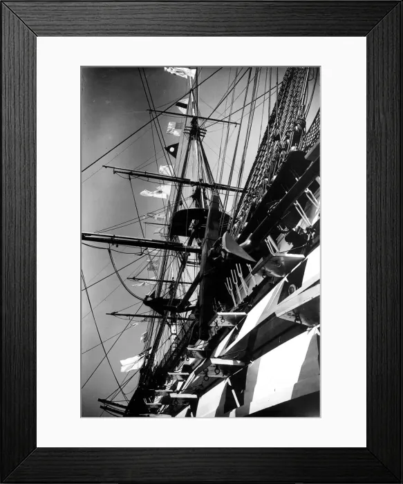 Framed Print : HMS Victory the flagship of the fleet flying signal flags for King George V Silver