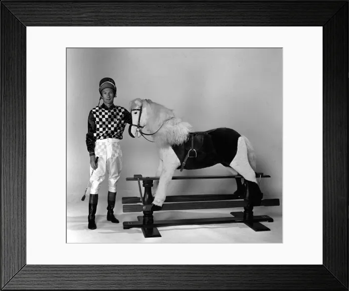 Framed Print : Lester Piggott posed with Rocking Horse in the Daily Mirror studio after being told Framed Print : Lester Piggott posed with Rocking Horse in the Daily Mirror studio after being told