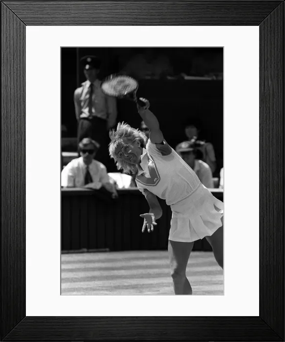 Framed Print : Martina Navratilova serves during the Wimbledon ladies final against Chris Evert Lloyd Framed Print : Martina Navratilova serves during the Wimbledon ladies final against Chris Evert Lloyd