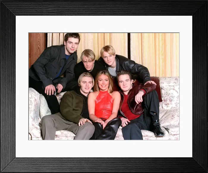 Framed Print : Westlife pop group December 1999 with television presenter Cat Deeley filming in