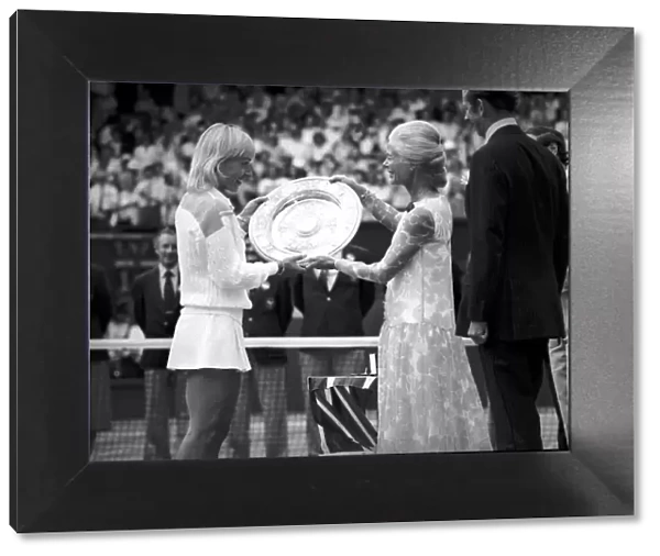 Martina Navratilova receives shield from Duchess of kent after beating Chris Evert in