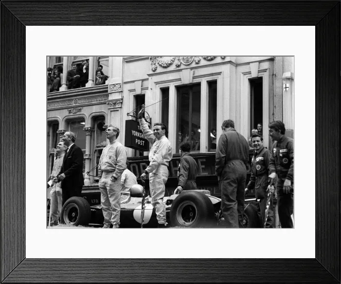 Framed Print : 1964 Racing Driver Jim Clark waves to the Crowd Framed Print : 1964 Racing Driver Jim Clark waves to the Crowd