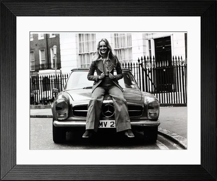 Framed Print : Model, Twiggy, pictured in London sitting on the bonnet of her Mercedes sports car Framed Print : Model, Twiggy, pictured in London sitting on the bonnet of her Mercedes sports car