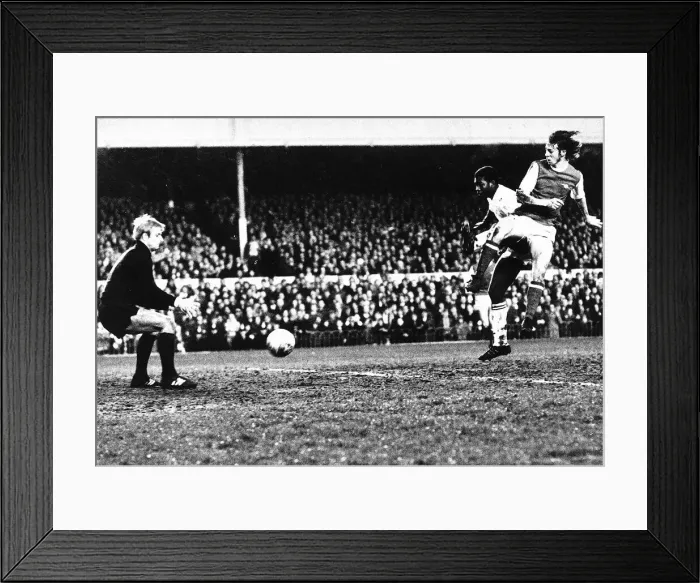 Framed Print : Charlie George of Arsenal attacks Anderlecht goal 1970