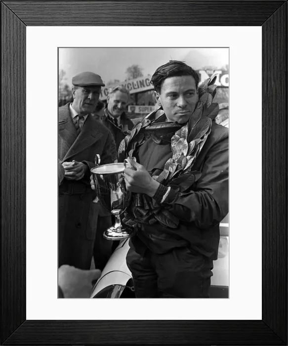 Framed Print : Jim Clark motor racing champion with trophy in 1963 Framed Print : Jim Clark motor racing champion with trophy in 1963