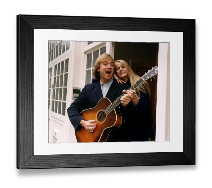Framed Print : Justin Hayward lead singer of the moody blues plays guitar with his daughter Doremi Framed Print : Justin Hayward lead singer of the moody blues plays guitar with his daughter Doremi
