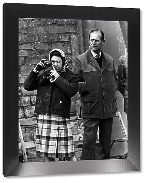 Tthe Queen with Prince Philip, taking picture at Badminton Horse Trials