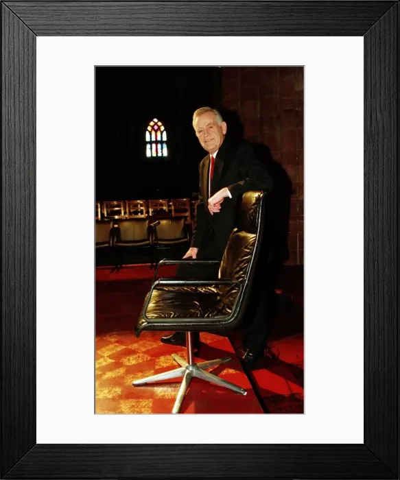 Framed Print : Magnus Magnusson television presenter seen here with the Mastermind chair in St Magnus Framed Print : Magnus Magnusson television presenter seen here with the Mastermind chair in St Magnus