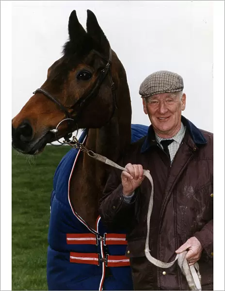 Ginger McCain holds the 26 year old race horse by the reins Circa January 1992