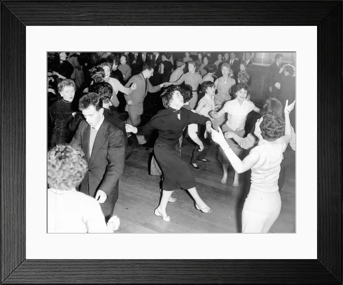 Framed Print : Young dancers crowd the floor for a rock n roll dance Framed Print : Young dancers crowd the floor for a rock n roll dance