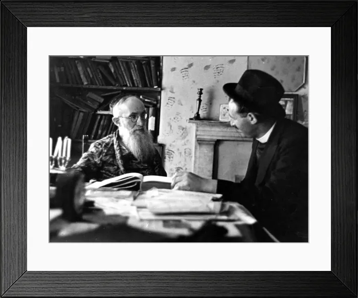Framed Print : Rabbi Szpetman talks with Rabbi Jack Sheiman. The books on the table are all that is left Framed Print : Rabbi Szpetman talks with Rabbi Jack Sheiman. The books on the table are all that is left