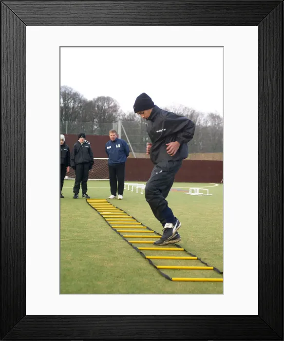 Framed Print : Alan Ball working with Theo Walcott during his days at Southampton, Circa 1995