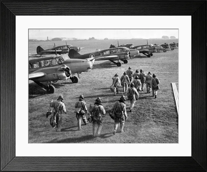 Framed Print : RAF pilots and crew make their way to their Avro Anson planes during World War Two Framed Print : RAF pilots and crew make their way to their Avro Anson planes during World War Two