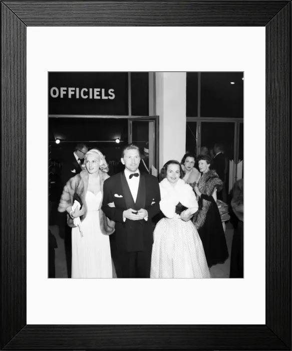 Framed Print : Actor Kirk Douglas with, Olivia de Havilland and Roxanne. D3118-027
