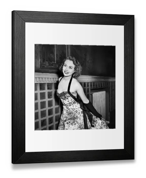Framed Print : Clothing Fashion 1953. Miss Hazel Court arrives wearing a black velvet floral design
