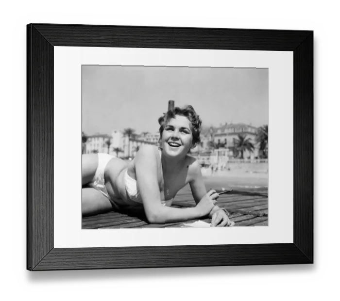 Framed Print : Cannes Film Festival 1953. Lise Michaud seen here modeling a bikini on a speed boat just Framed Print : Cannes Film Festival 1953. Lise Michaud seen here modeling a bikini on a speed boat just