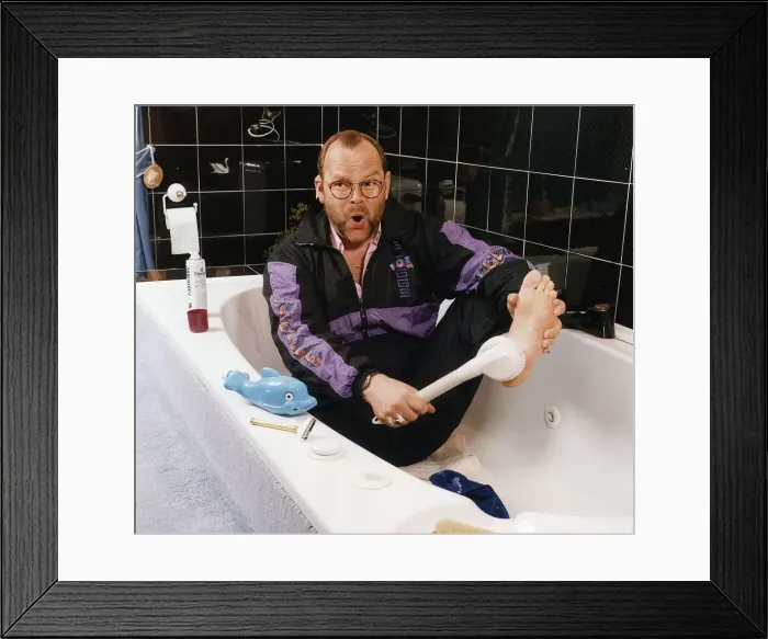 Framed Print : James Whale radio presenter sits in the bath wearing a tracksuit Framed Print : James Whale radio presenter sits in the bath wearing a tracksuit