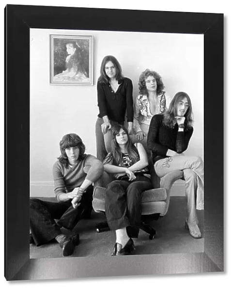 Curved Air pop group, (seated front) Florian Pilkington - Milka, 21 (left)
