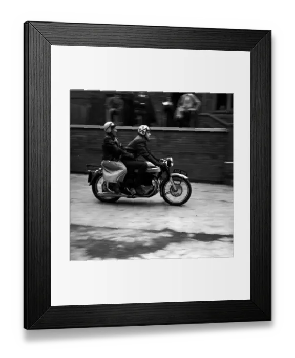 Framed Print : With her crash helmet on fair and square, and goggles flipped back