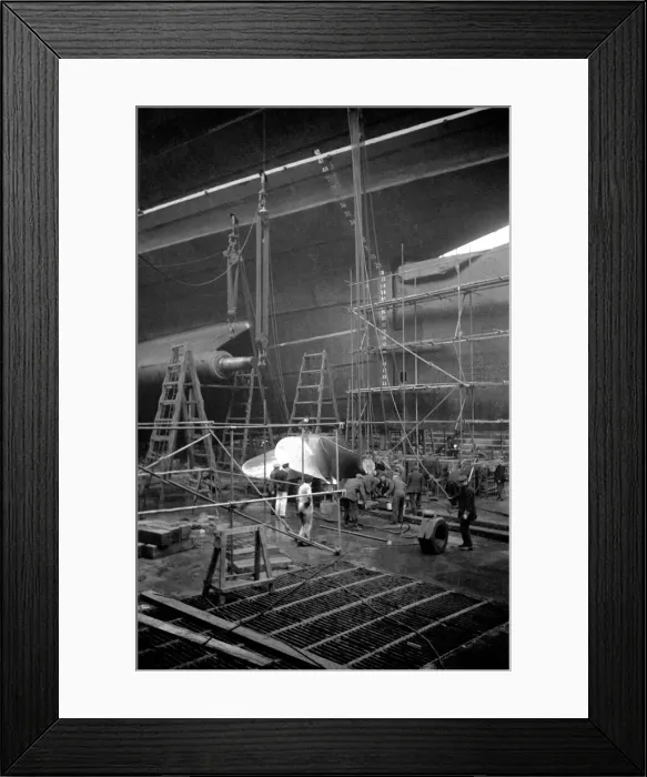 Framed Print : The RMS Queen Mary is in dry dock at Southampton undergoing refitting Framed Print : The RMS Queen Mary is in dry dock at Southampton undergoing refitting