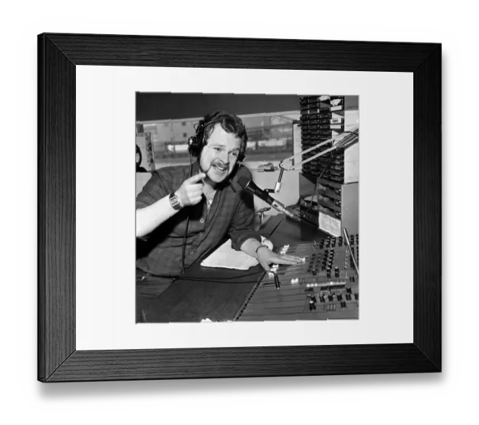 Framed Print : Metro Radio D J James Whale seen here at work in the studio