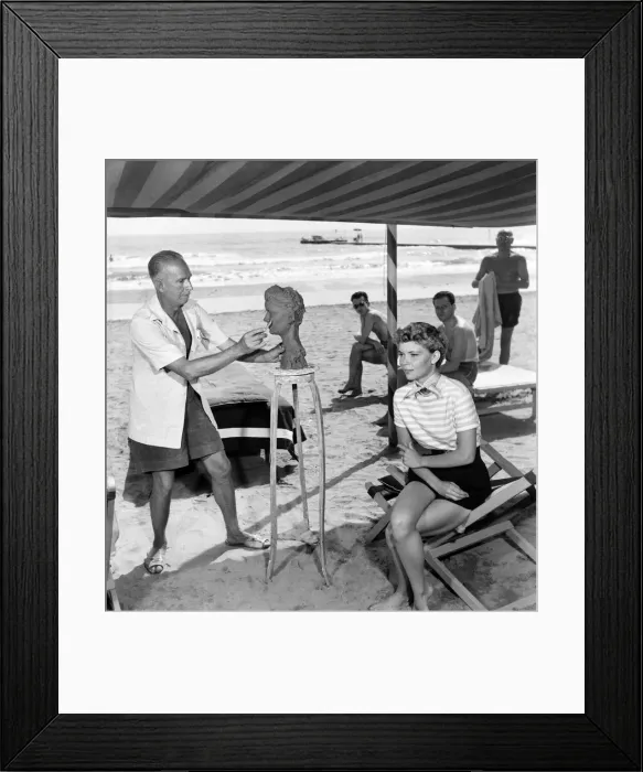Framed Print : Actress Francis Farmer seen here having bust created on the beach near Venice Framed Print : Actress Francis Farmer seen here having bust created on the beach near Venice