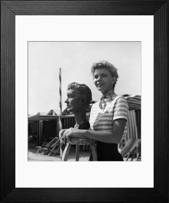 Framed Print : Actress Francis Farmer seen here having bust created on the beach near Venice Framed Print : Actress Francis Farmer seen here having bust created on the beach near Venice