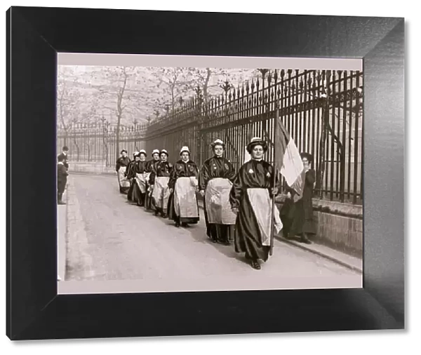 November 1908 Suffragettes in Prison Garb leave Clements Inn to advertise their upcoming