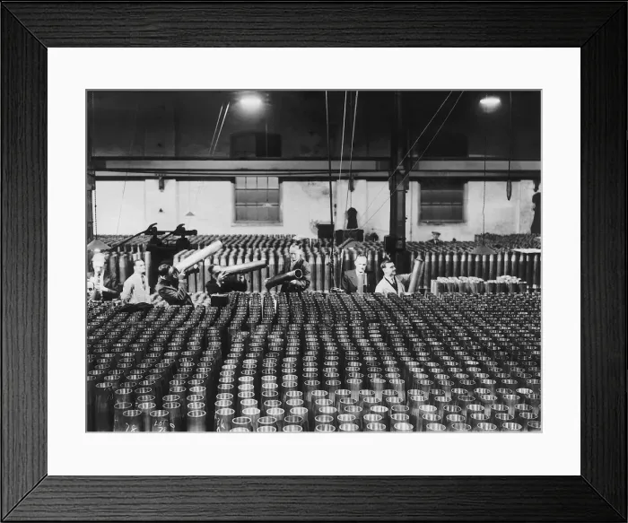Framed Print : Inspectors check the quality of shells for naval guns in a munitions factory during WW2