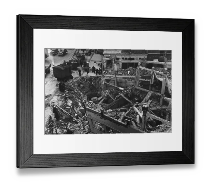 Framed Print : Workmen and rescue services work on the remains of Sloane Square Underground Station in