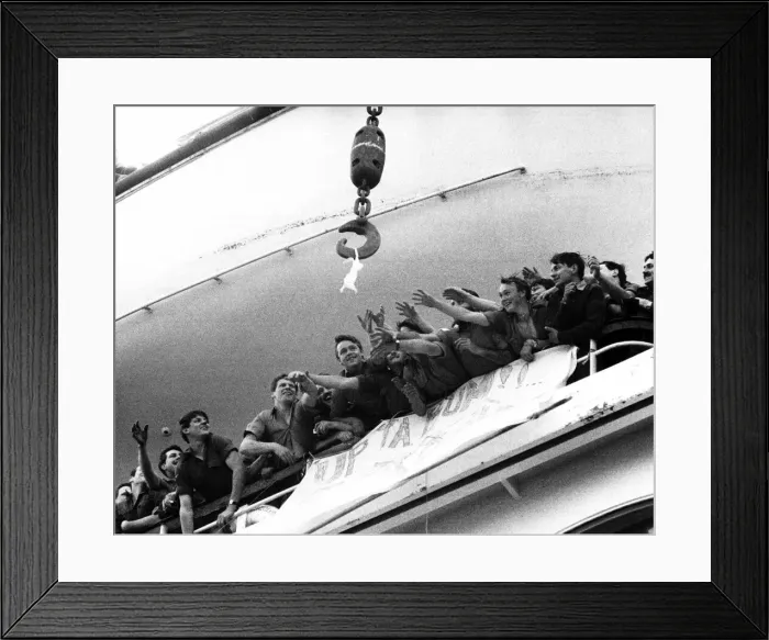 Framed Print : War Falklands 1982 Soldiers aboard the QE2 reaching out for a bra that is up for grabs