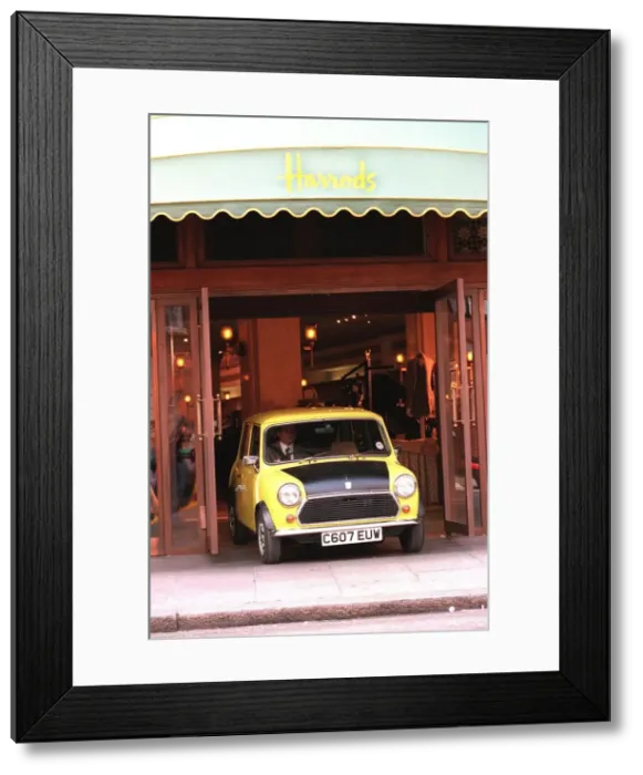 Framed Print : Rowan Atkinson Actor as Mr Bean filming at Harrods