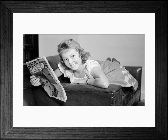 Framed Print : Teenager Lesley Woods reading the Mirabelle magazine Girl Laying Framed Print : Teenager Lesley Woods reading the Mirabelle magazine Girl Laying