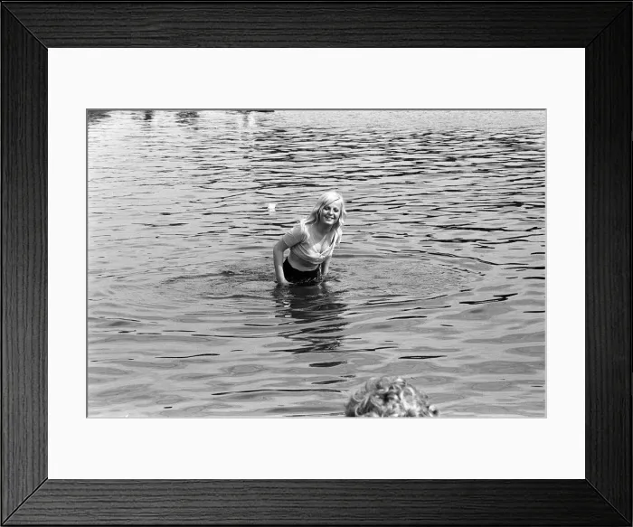Framed Print : A concert goer cools of in the serpentine during the free Rolling Stones concert in Hyde Framed Print : A concert goer cools of in the serpentine during the free Rolling Stones concert in Hyde