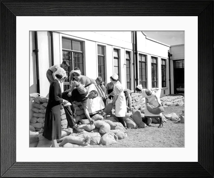 Framed Print : Nurses filling sandbags, September 1939. Women fulfilling mens work duties during