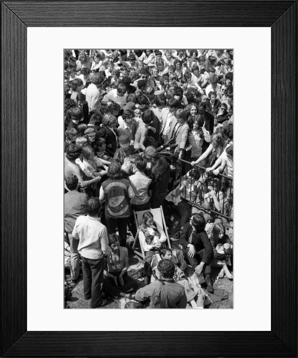 Framed Print : Hells Angels help pass a collapsed fan forward to the fist aid attendants at free Rolling Framed Print : Hells Angels help pass a collapsed fan forward to the fist aid attendants at free Rolling