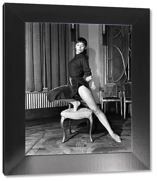 21 year old French dancer Leslie Caron who is rehearsing her chair dance for tonight