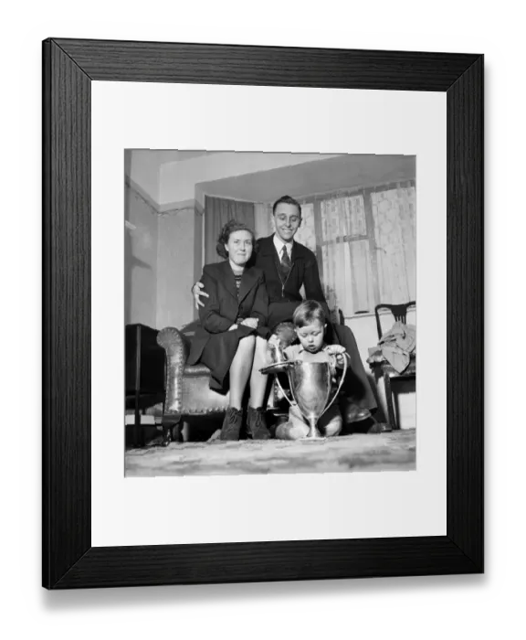 Framed Print : Johnny Leach, new world table tennis champion with wife and son and trophies Framed Print : Johnny Leach, new world table tennis champion with wife and son and trophies